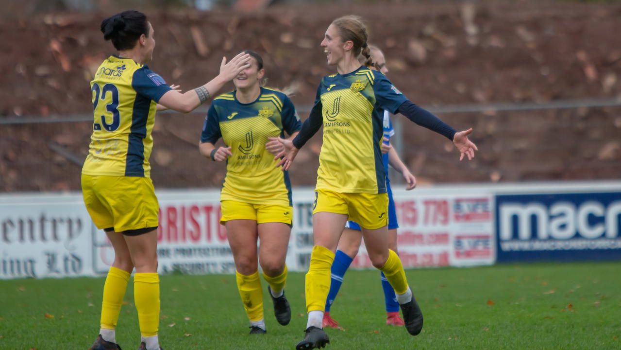 Shannon Albuery celebrates with Gemma Simmonds and Meg Fox